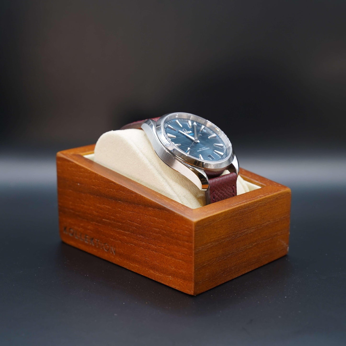 Beige wooden watch case with microsuede interior. A stylish and functional way to store your watches. Made of high-quality wood and microsuede. Available in beige and grey.