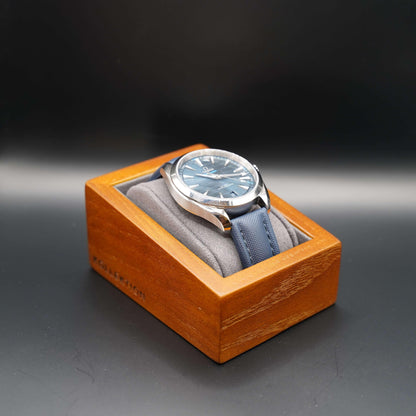 Grey wooden watch case with microsuede interior. A great way to keep your watches safe and secure. Made of high-quality wood and microsuede. Available in beige and grey.